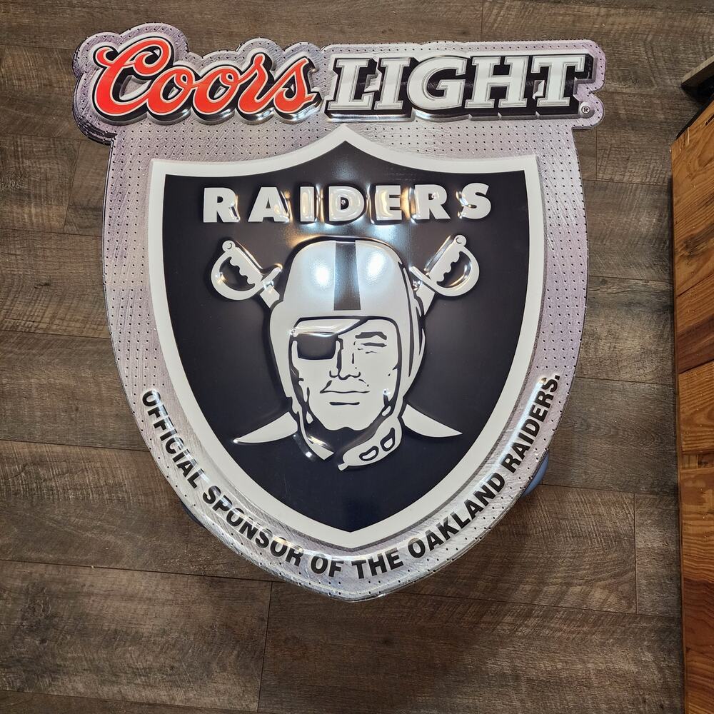Oakland Raiders sponsored by Coors Light thin metal wall sign very lightweight